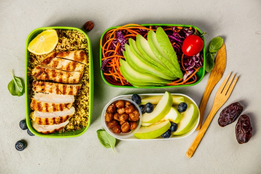 Healthy meal prep with fresh fruits, vegetables, and lean protein